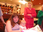 Carol and Chloe opening Christening presents on 20 April 2003