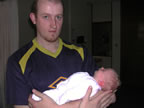 Me (Steve) holding my God-daughter Chloe